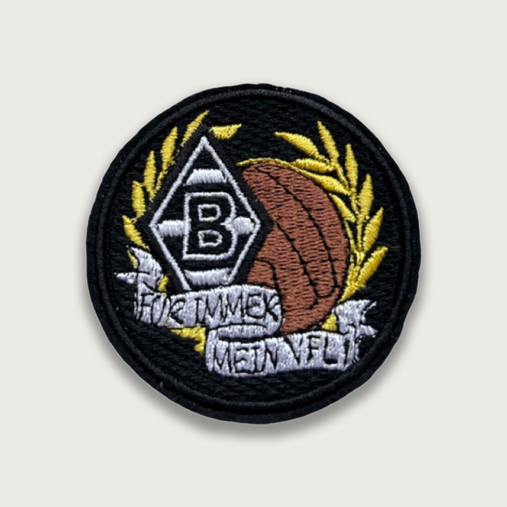 Embroidered patch with Borussia Mönchengladbach logo, retro brown football, yellow laurels, and “Für Immer Mein VfL” text