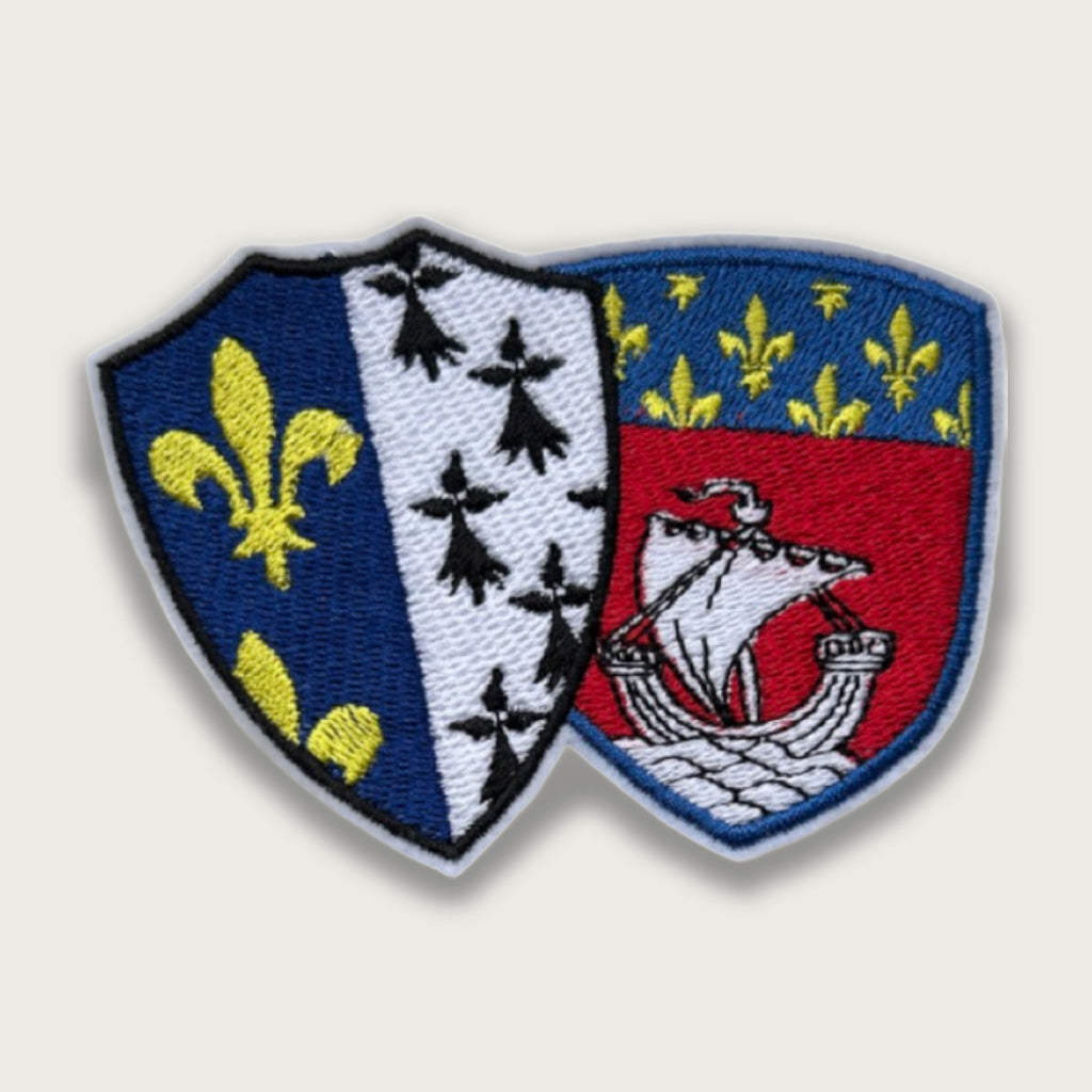 Embroidered French coat of arms patch featuring two overlapping shields: one with fleur-de-lis and ermine symbols, the other with a historic ship and royal blue-gold crest. Perfect for heritage apparel and collectors.