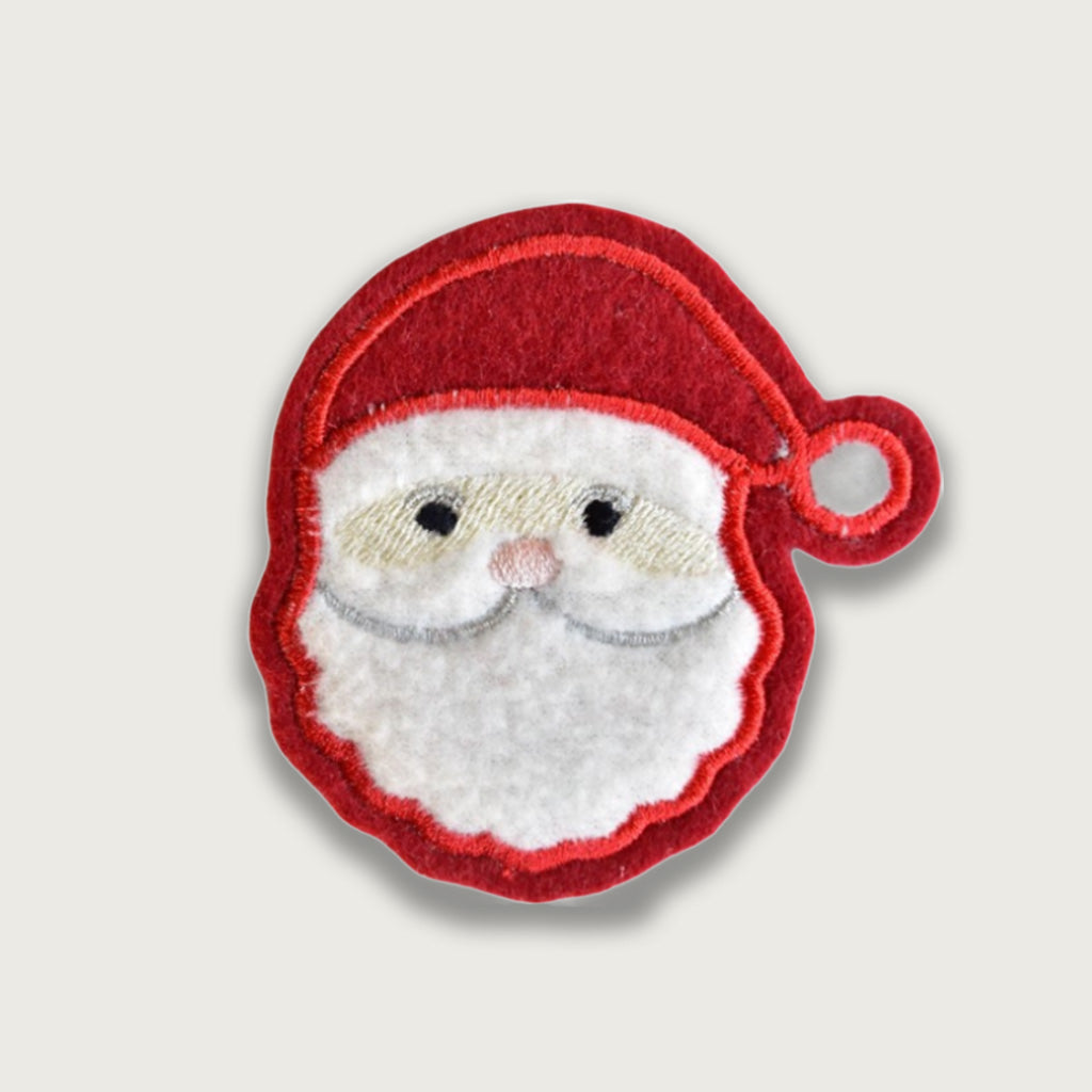Cute embroidered Santa Claus patch featuring a red hat and white beard, ideal for Christmas clothing, festive crafts, stockings, or holiday decorations